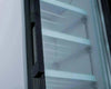 Interior view of the G258BMF-HC glass door refrigerator 21.5 inch showcasing its shelving and transparent glass door.