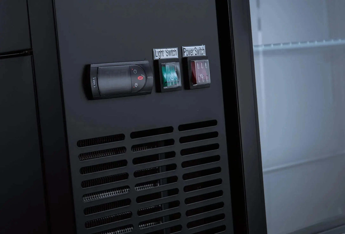 Control panel of UBB-24-48G-HC Two Glass Door Back Bar Cooler with light and power switches.