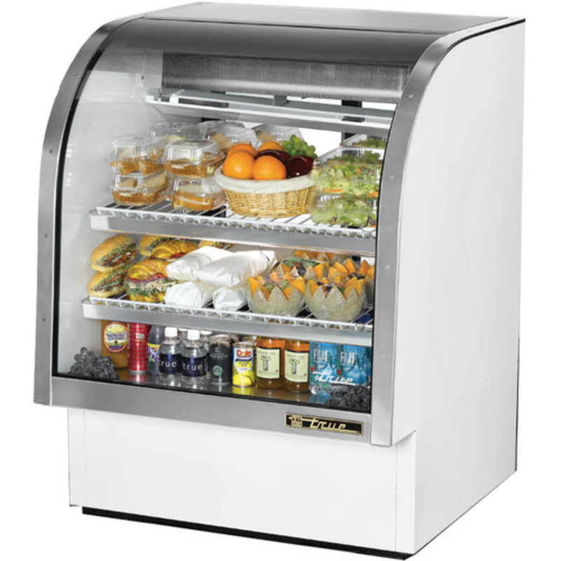 Curved glass deli merchandiser showcasing fresh salads, sandwiches, drinks, and fruits in a stylish display unit.